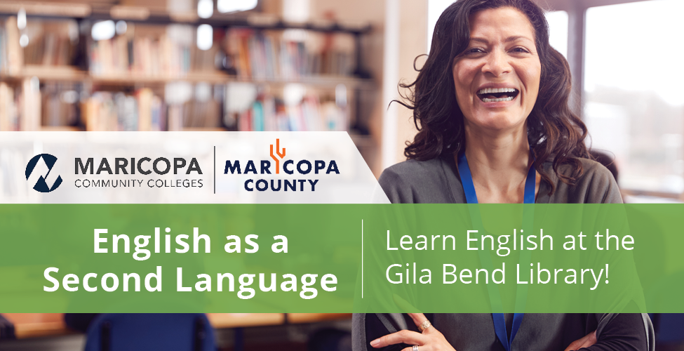 A woman wearing a lanyard and smiling in a library with a conference table behind her. Text on the image says "English as a Second Language | Learn English at the Gila Bend Library!" and is accompanied by the Maricopa Community Colleges logo and the Maricopa County logo.