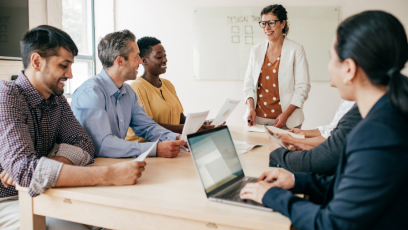 Employees meeting together to share knowledge.