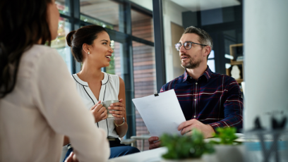 Employees receiving feedback from manager