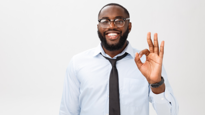 A man holding up the "okay" sign