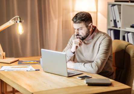 Male professional working on laptop