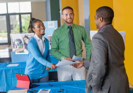 Job seekers atttending an in-person job fair. 