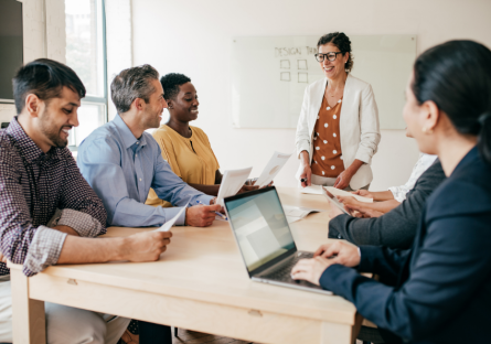 Employees meeting together to share knowledge.