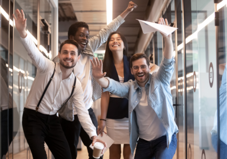 Happy group of employees cheering