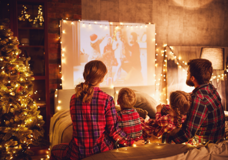 Family watching holiday movies together