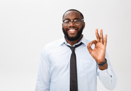 A man holding up the "okay" sign