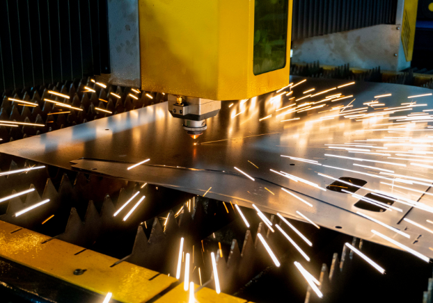 Manufacturing machine making sparks on metal