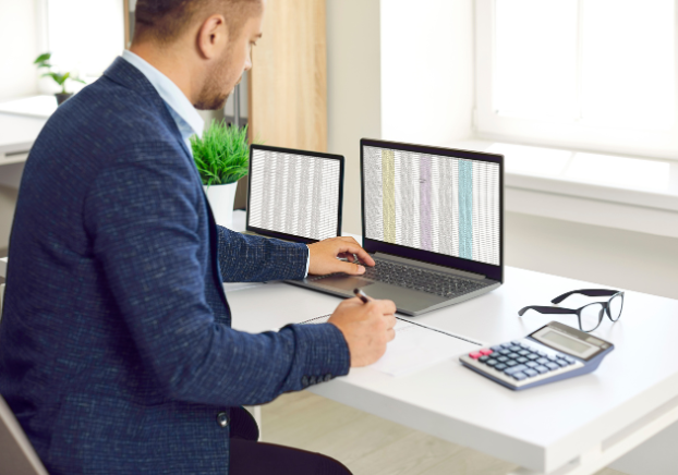 Man using computer program for business