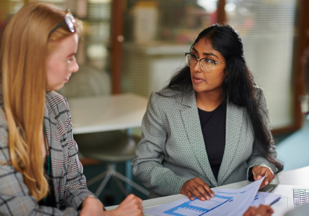 Female paralegal advising female client