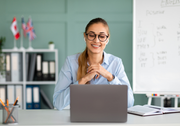 English-learning woman sitting in front of laptop